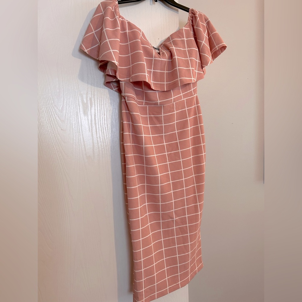 Women’s middi length off the shoulder dress.